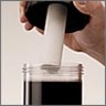 The MagnaClean Professional filter is placed into the container... The MagnaClean Professional filter is placed into the container...